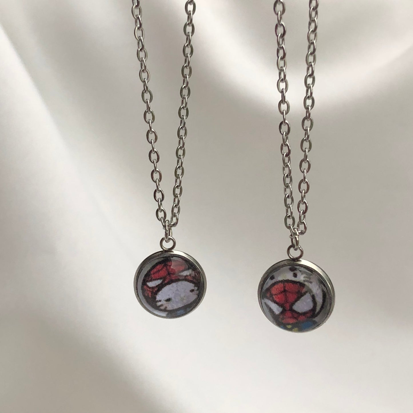 kitty & spiderman necklaces